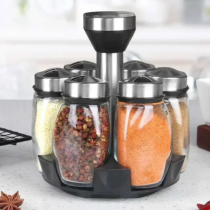 Bekas Rempah Kaca dengan Rak Botol Perasa Garam dan Lada Dapur